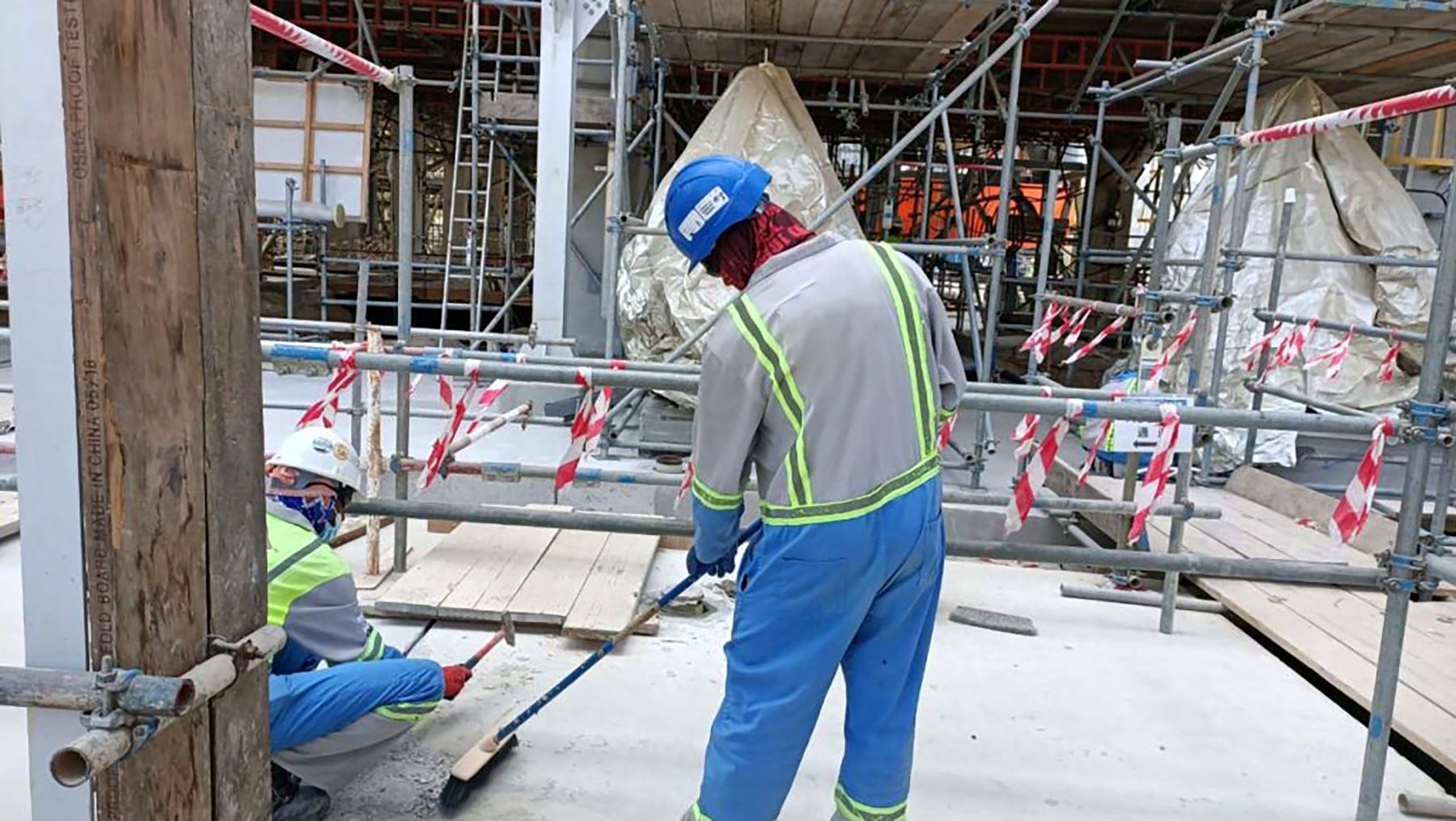 Workers in protective equipment